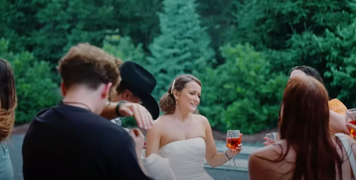 Bride and guests enjoying an outdoor reception